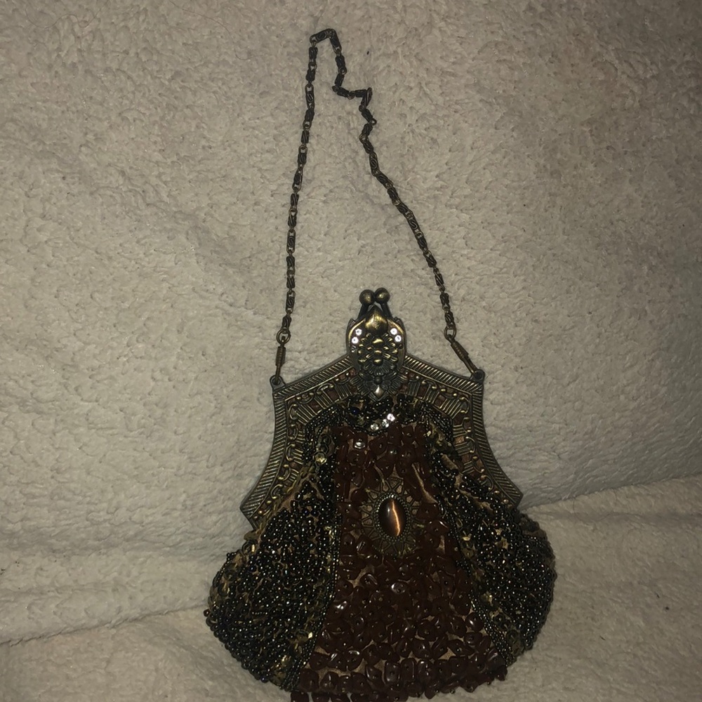 Embroidered hand clutch